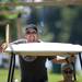 Taylor resident Paul Jesmantas attempts to collect rings using a pole while riding a golf cart at the Saline Celtic Festival on Saturday, July 13. Daniel Brenner I AnnArbor.com